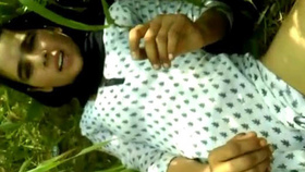 Indian woman engages in outdoor sex wearing traditional attire in a reed field