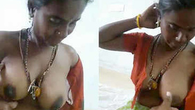 Tamil maid with large breasts engages in sexual activity