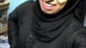 A Pakistani girl wearing a burka reveals and stimulates herself