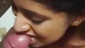 A Trinidadian girlfriend gives a sensual blowjob to a stiff penis