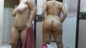 Elderly Indian aunt's voluptuous rear end