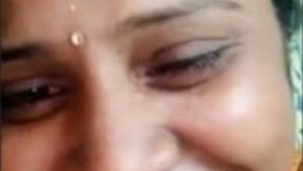 A seductive Indian woman reveals her breasts