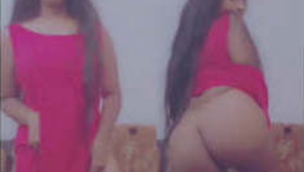 A seductive Indian woman entices with her buttocks