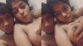 Indian man fondles petite breasts of a woman on film