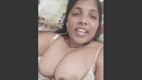 Indian aunt touches her large vagina