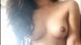 Indian beauty reveals her breasts during a video chat