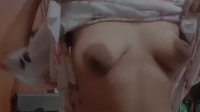 A captivating Indian woman with large breasts in a sensual video, featuring the bhabi tag
