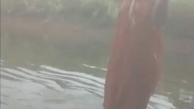 Desi aunt's sensual outdoor bath leads to intimate encounter with lover