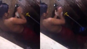 A sultry Indian beauty takes a steamy bath