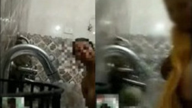 Indian plus-size woman taking a bath during a video chat