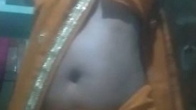 Village bhabhi reveals her sensual side with breasts and pussy show