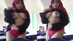 A young hijabi girl from India reveals her pretty breasts