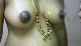 Indian aunt undressed at home with her spouse providing water