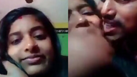 Seductive Indian student looks into the camera with partner filming porn