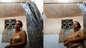Nude Indian woman relaxes solo in the shower in amateur hd porn clip