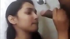 Pretty single girl giving her uncle a blowjob in the bathroom