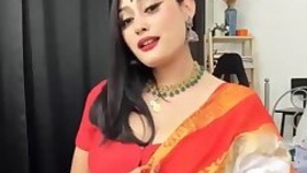 Cute Anna Sexy lives in an orange sari