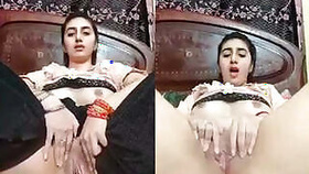 Sexy Pakistani beauty rubbing her pussy